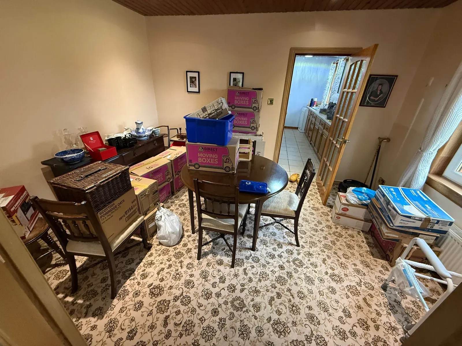 An estate dining room full of belongings before a probate clearance