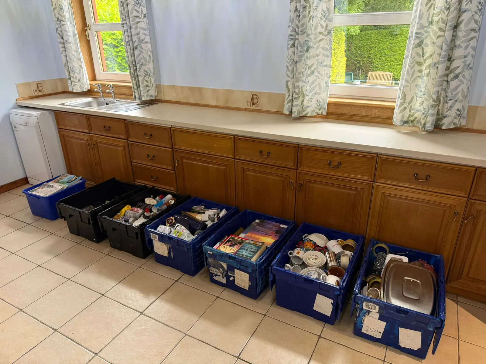 Good-quality items sorted into crates ready to pass on locally
